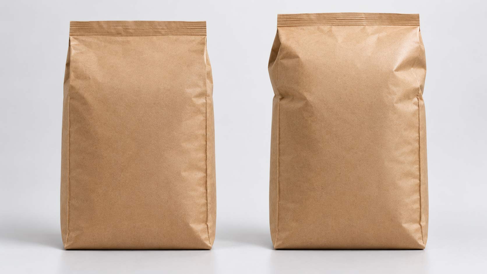 Two kibble bags side by side, one filled with generous headspace and one filled tight, showing how much air each one traps